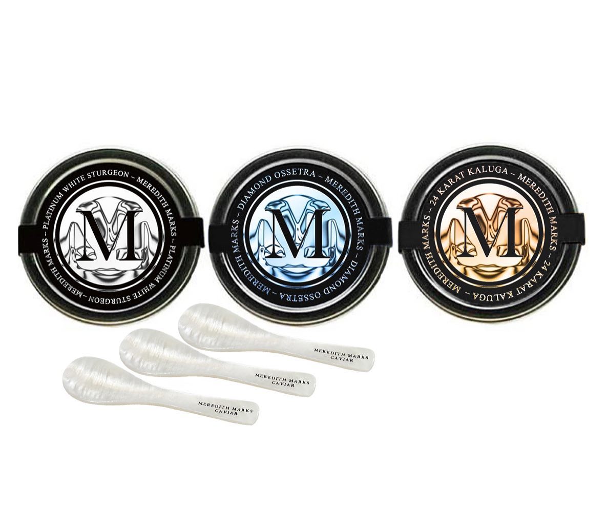 A spread of tins of Meredith Marks' different types of caviar and mother-of-pearl spoons.